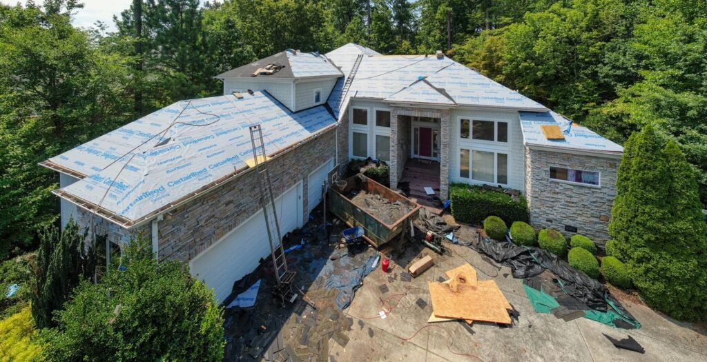 Roof inspection in Forest Hills, TN examining tile roof alignment