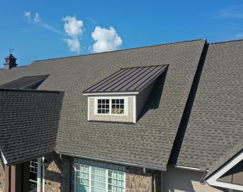 Roof inspection near me in Forest Hills, TN assessing weather impact on estate roofing