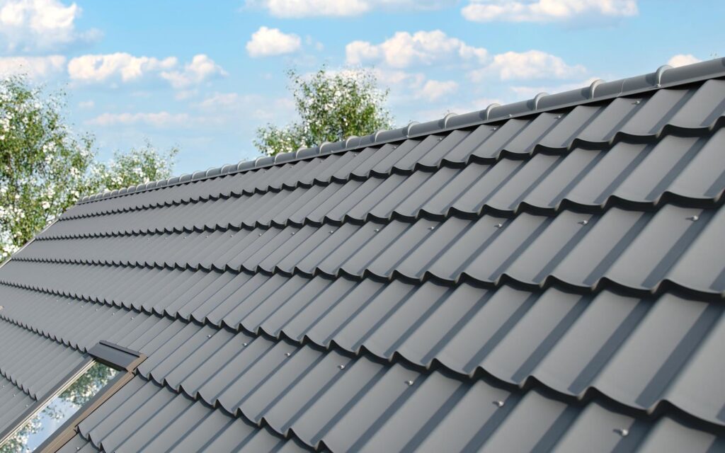 Metal roofer in Nashville, TN installing a standing seam roof on a residential home