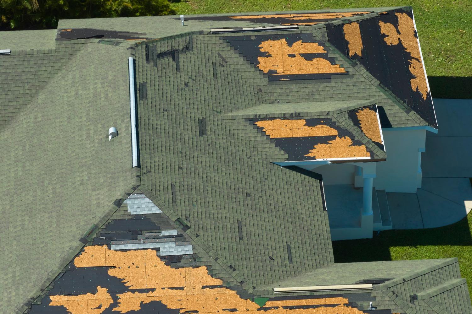 Roof inspection in Nashville, TN checking storm damage on residential home