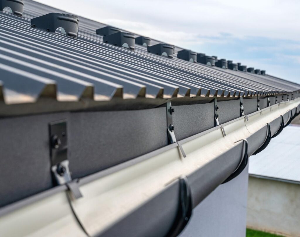 Seamless gutter installation near me in Forest Hills, TN on a well-kept property